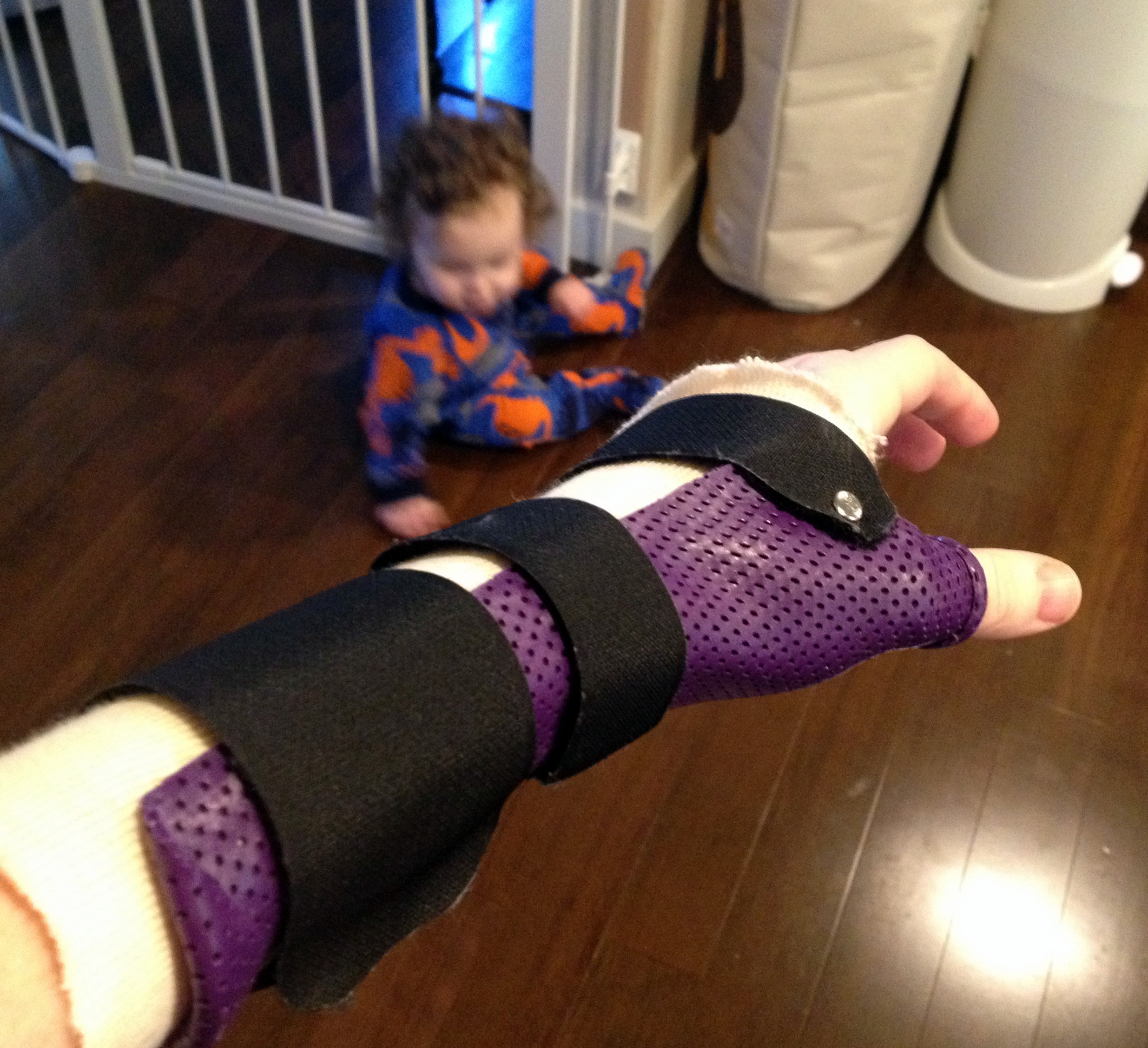 My hard splint made of thermoplastic helps keep my wrist and thumb protected as I lift and carry Charlie.
